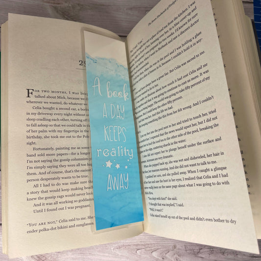 Blue Bookmark - A Book A Day Keeps Reality Away